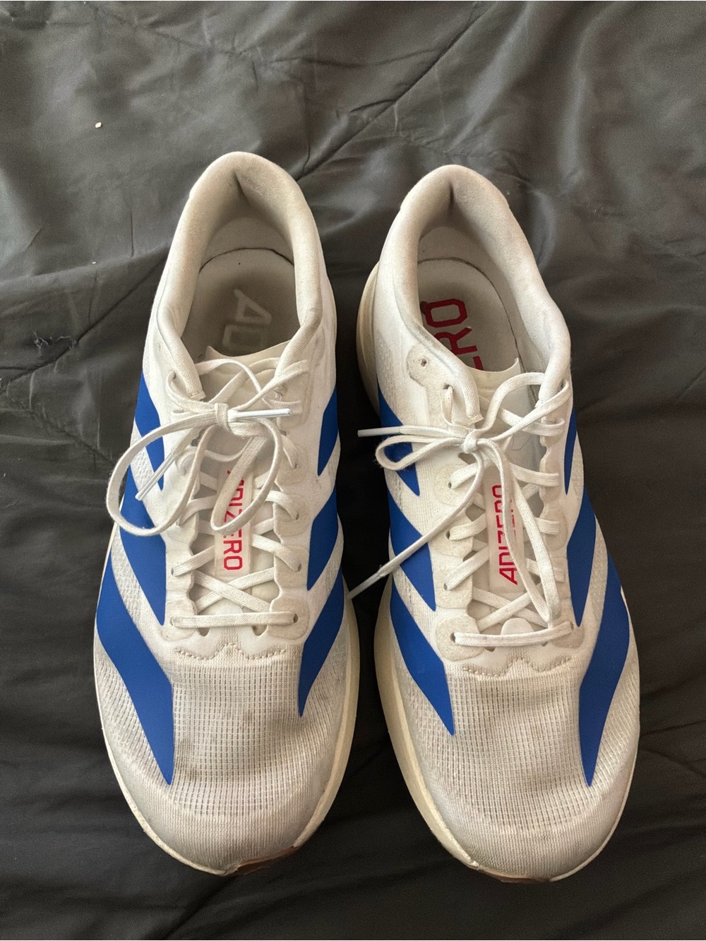 Men’s pre owned as is Adidas Evo SL Size 11.5 AJS4494 White Royal Blue Running
